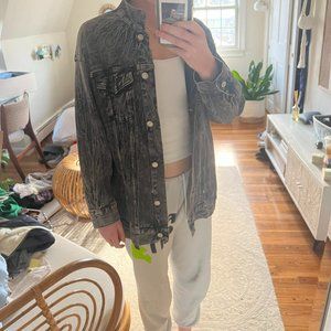 Distressed oversized denim jacket